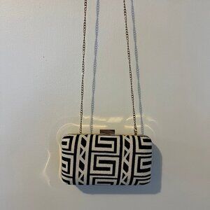 Bebe geometric cross body clutch